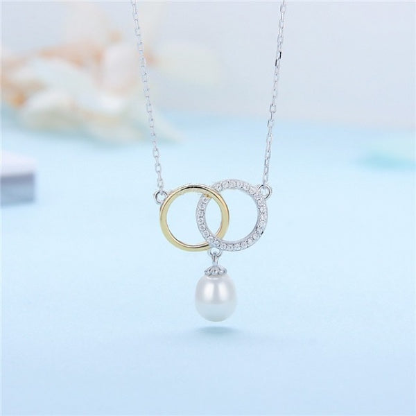 Sterling Silver Pearl Intertwined Circle Necklace